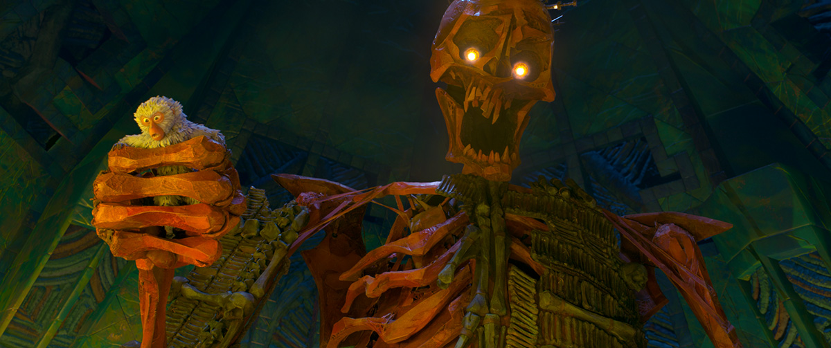 2100.0400.still.laika.0004_R(left) Monkey, voiced by Academy Award winner Charlize Theron, gets trapped in the Hall of Bones and caught in the grip of the Giant Skeleton in animation studio LAIKA’s epic action-adventure KUBO AND THE TWO STRINGS, a Focus Features release.Credit: Laika Studios/Focus Features